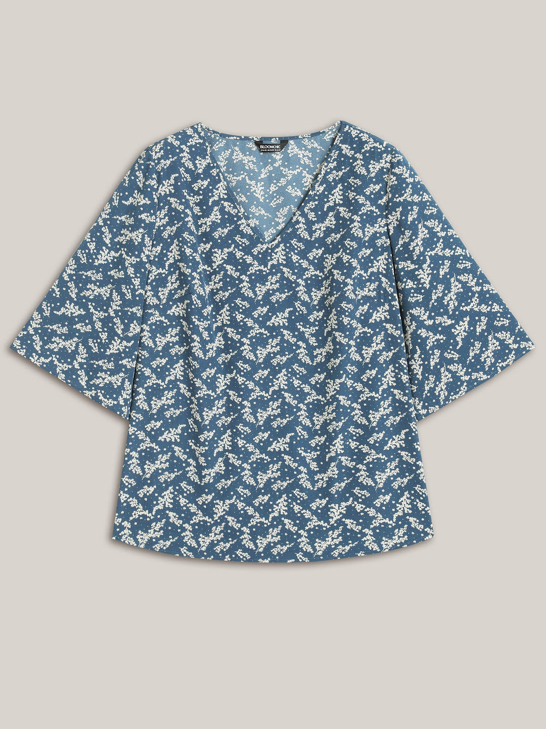 Floral Print Curvy Hem V-Neck Shirt