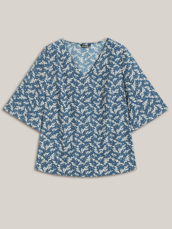 Floral Print Curvy Hem V-Neck Shirt