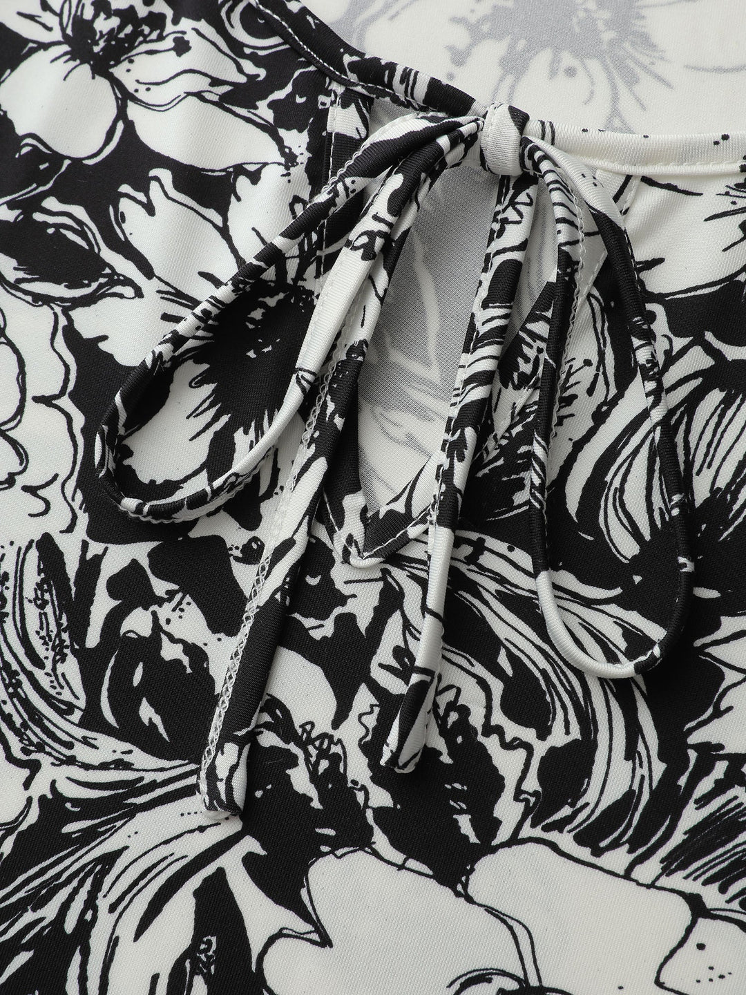Stretchy Silhouette Flower Knit Top
